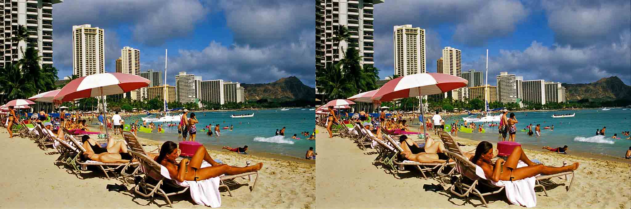 Encore un peu de plage, au soleil des tropiques, au pied des hôtels de luxe, sous l??il de Diamond Head.